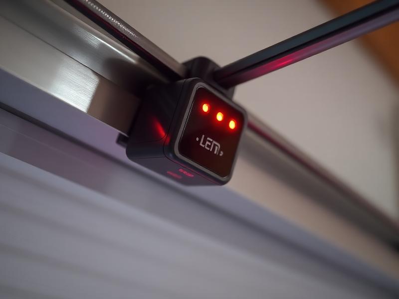 Garage door safety sensor with LED indicator lights protecting children